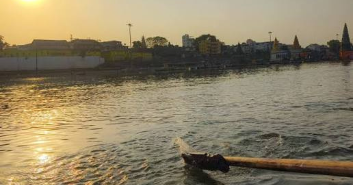 Chandrabhaga River at sunrise with devotees taking a holy bath