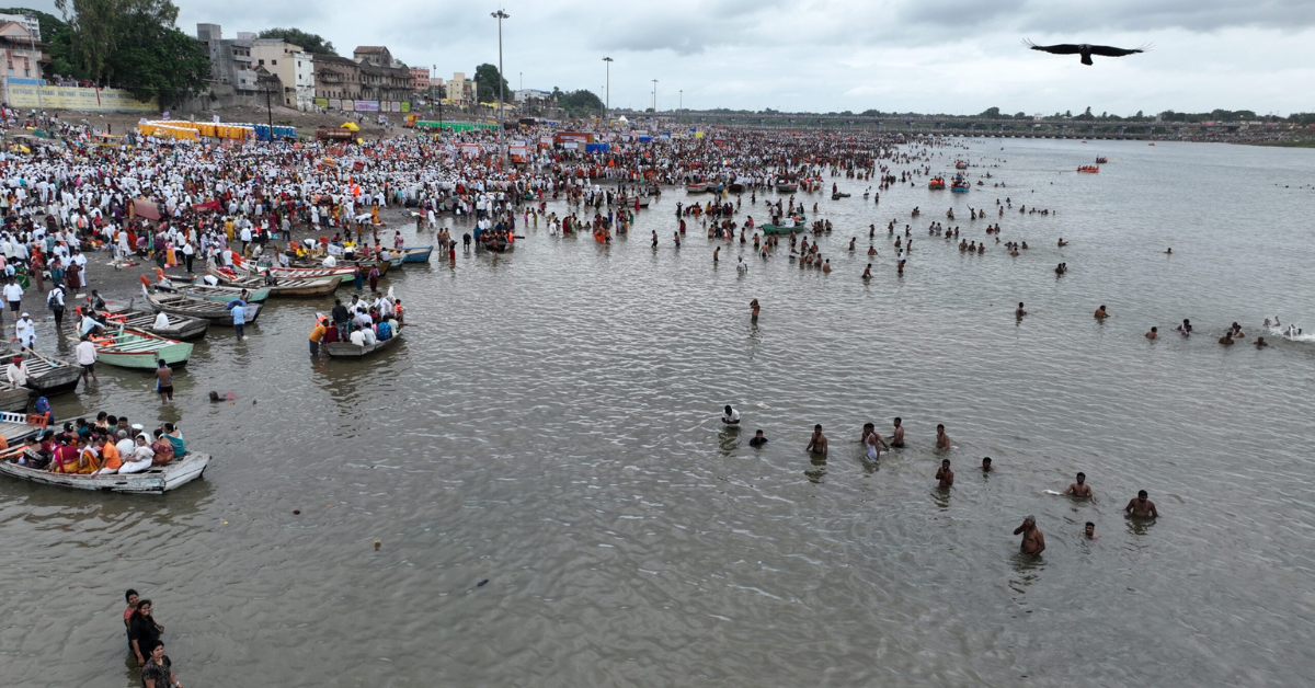 Devotees taking holy bath in Chandrabhaga River